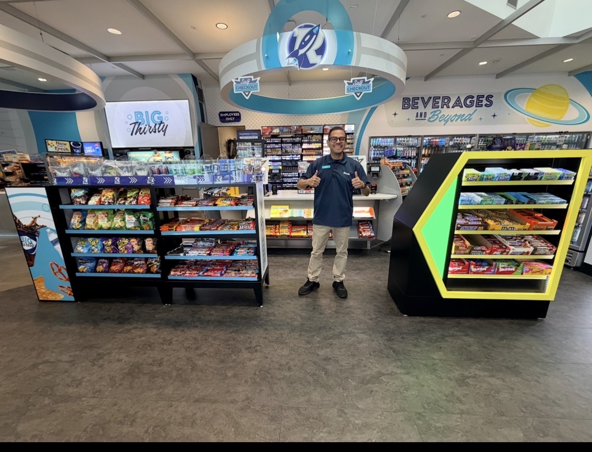 C-store installation — branded approach zone with Arrow fixture